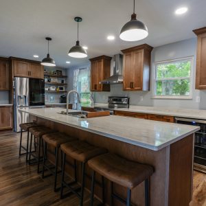 Beautifully-remodeled-kitchen-with-new-wood-cabinets-hardwood-floors-and-stainless-steel-appliances