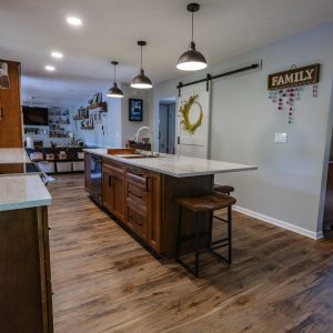 Kitchen-island-and-barn-door-to-pantry